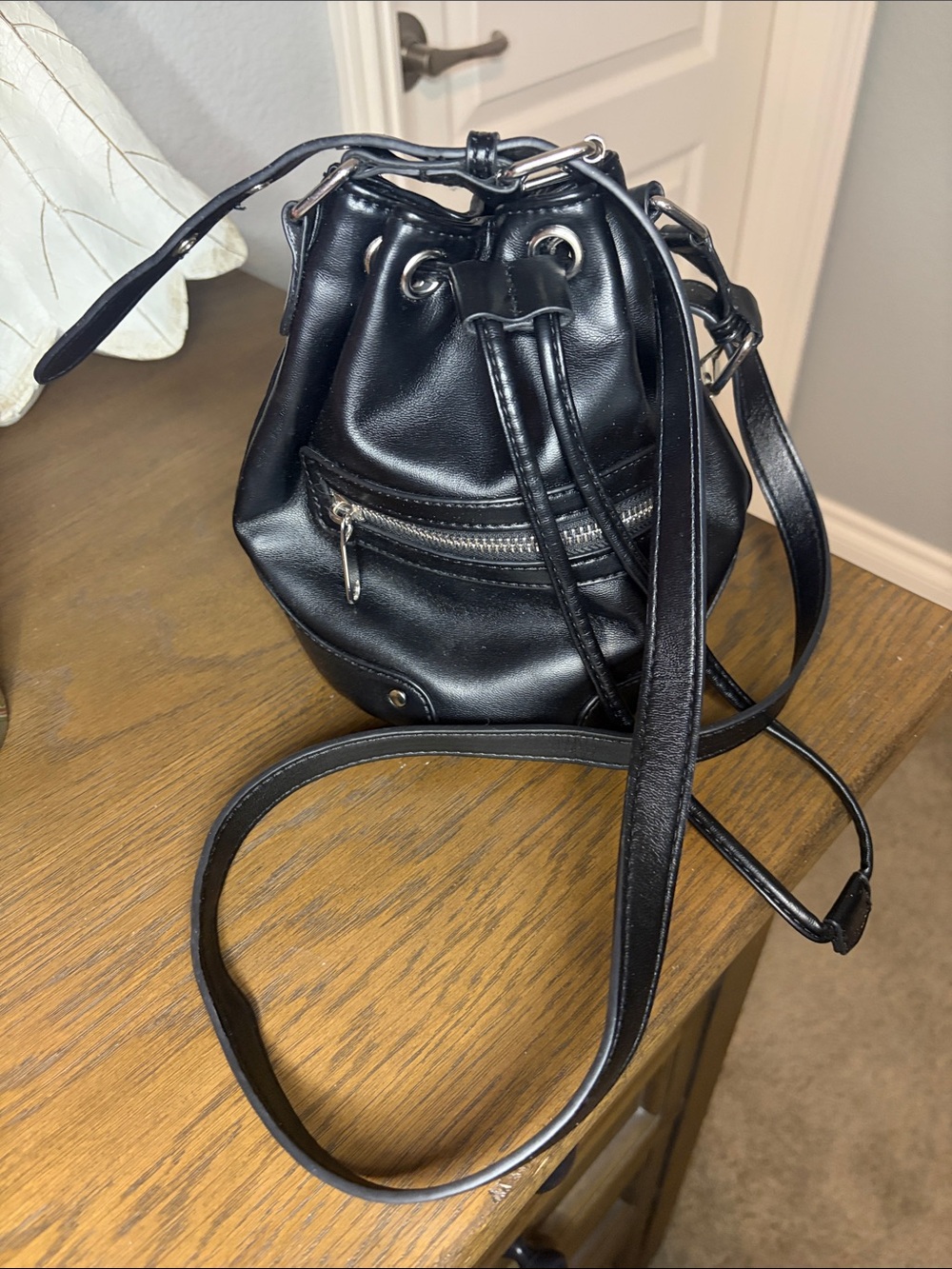 NWOT Forever 21 Black Drawstring Bucket Crossbody with Front Zip Pocket